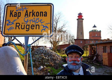 sculpture of an old sailor in a foregarden, lighthouse and Schinkelturm in the background, Germany, Mecklenburg-Western Pomerania, Ruegen, Kap Arkona Stock Photo