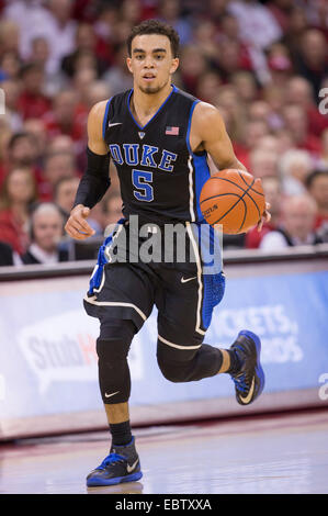 December 3, 2014: Duke Blue Devils guard Tyus Jones #5 leads the dribbles the ball up court during the NCAA Basketball game between Duke Blue Devils and the Wisconsin Badgers at the Kohl Center in Madison, WI. Duke defeated Wisconsin 80-70. John Fisher/CSM. Stock Photo
