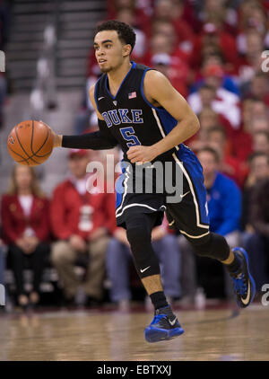 December 3, 2014: Duke Blue Devils guard Tyus Jones #5 leads the fast break up court during the NCAA Basketball game between Duke Blue Devils and the Wisconsin Badgers at the Kohl Center in Madison, WI. Duke defeated Wisconsin 80-70. John Fisher/CSM. Stock Photo