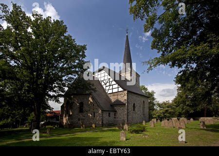 1000 years old church in Stiepel, Stiepeler Dorfkirche, with graves in the foreground, Germany, North Rhine-Westphalia, Ruhr Area, Bochum