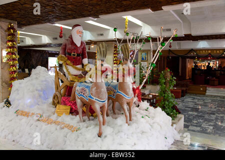 big sculpture of Santa Clause with sledge in a hotel lobby, Egypt, Luxor Stock Photo