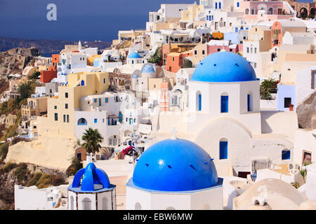 greek town Oia with blue domed houses, Greece, Santorini, Cyclades, Oia Stock Photo