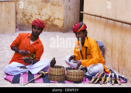 common cobra, Indian cobra (Naja naja), two serpent charmers , India Stock Photo