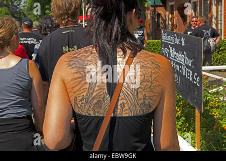 tattoo on the back of a woman, Germany, Schleswig-Holstein, Wacken Stock Photo