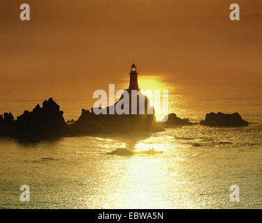 GB - JERSEY: La Corbiere Lighthouse at sunset Stock Photo