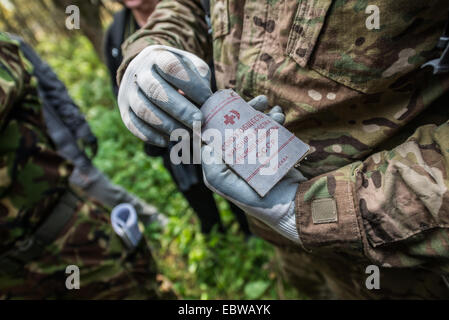 membership card of Federation of Red Cross and Red Crescent found in abandoned Stechanka town, Chernobyl Exclusion Zone, Ukraine Stock Photo