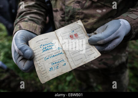 membership card of Federation of Red Cross and Red Crescent found in abandoned Stechanka town, Chernobyl Exclusion Zone, Ukraine Stock Photo