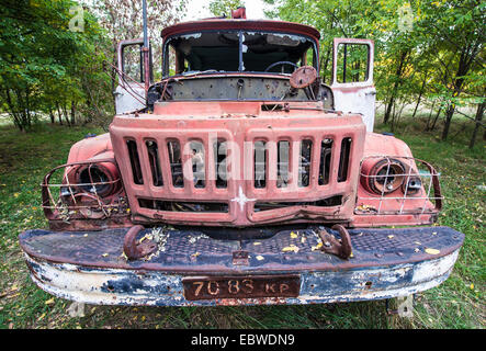 abandoned fire engine near former fish plant in Chernobyl Exclusion Zone, Ukraine Stock Photo