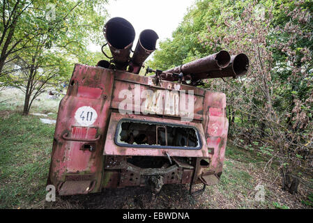 abandoned fire engine near former fish plant in Chernobyl Exclusion Zone, Ukraine Stock Photo