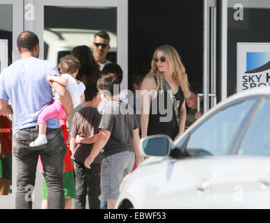 LeAnn Rimes exits by the backdoor while Brandi Glanville exits the side door of Sky High Sports center in Woodland hills after her son’s birthday party  Featuring: Eddie Cibrian,LeAnn Rimes Where: Los Angeles, California, United States When: 01 Jun 2014 Stock Photo
