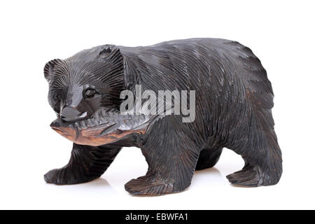 Wooden bear. Traditional Japanese souvenir, carved wood, white background Stock Photo