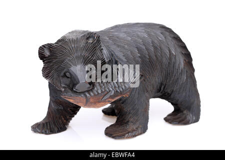 Wooden bear. Traditional Japanese souvenir, carved wood, white background Stock Photo