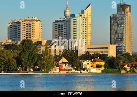Single homes and apartment buildings on Alte Donau or Old Danube river, Vienna, Vienna State, Austria Stock Photo