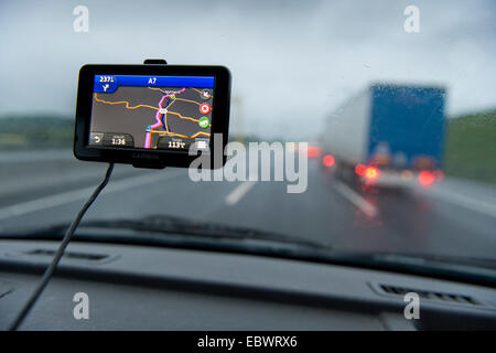 View through the windscreen of a car, satnav device, Germany Stock Photo