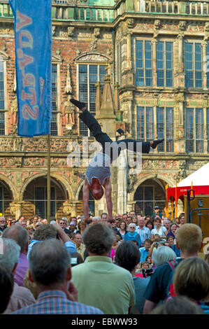 performer in front of city hall during an event, Germany, Bremen Stock Photo