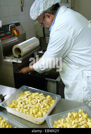 man working in food factory for ravioli Stock Photo