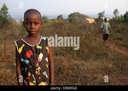 young girl on the way back from school, Burundi, Karuzi, Buhiga Stock Photo