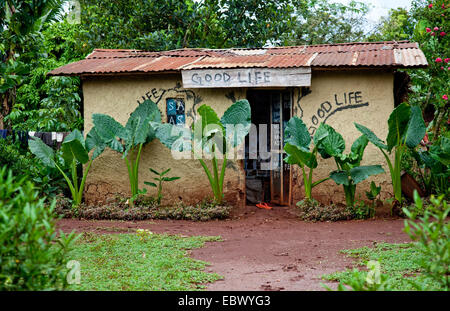 Simple painting of a house and garden Stock Photo - Alamy