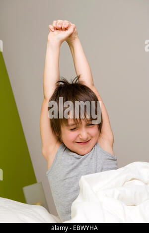 little boy wakes up in the morning Stock Photo
