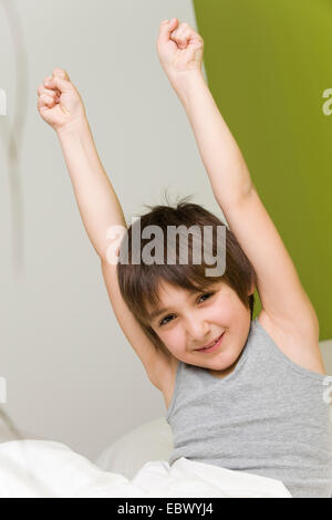 little boy wakes up in the morning Stock Photo