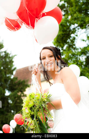 bride with balloons Stock Photo