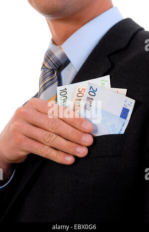 corruption, man pulling money from the jacket pocket, Germany Stock Photo