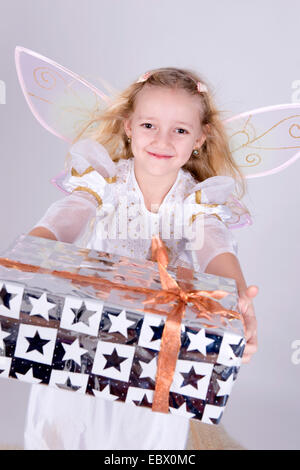 girl with christmas present Stock Photo