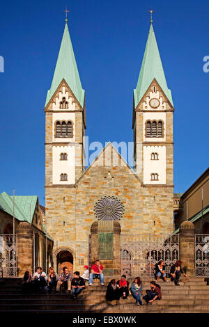 people in front of  the pilgrimage basilica Maria Visitation in Werl, Germany, North Rhine-Westphalia, Werl Stock Photo