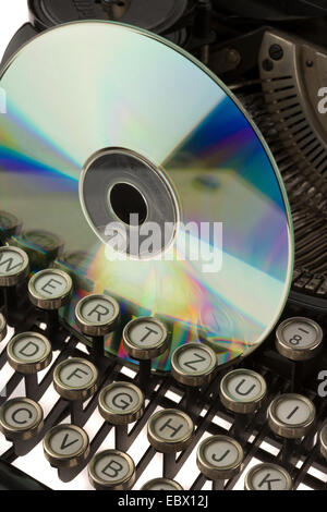 CD ROM sticking in the typewriter Stock Photo