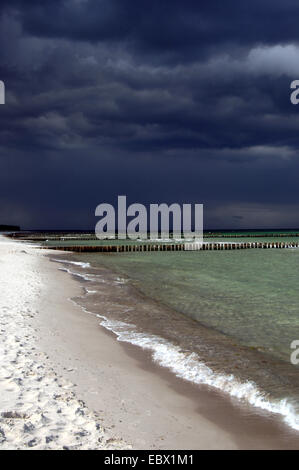 black clouds over sandy beach, Germany, Mecklenburg-Western Pomerania, Darss Stock Photo