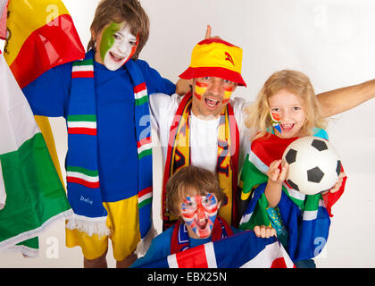 faher with children at the Socker world Championship 2010 in South Africa Stock Photo