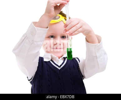 Early education. Young boy performing chemistry experiments Stock Photo