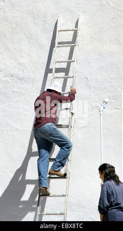 painter on the ladder Stock Photo