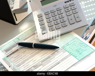 Pocket calculator with tax declaration Stock Photo