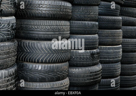 Used tires lying on a pile Stock Photo