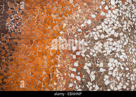 Trencadis mosaic background or texture from broken pieces of ceramic tiles, part of the Casa Batllo rooftop structure by Antoni Stock Photo