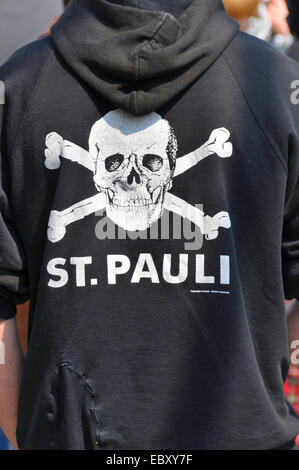 St Pauli fan with typical skull logo on hoody, Germany, Baden-Wuerttemberg
