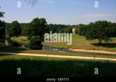 Through the Fuerst Pueckler Park in Bad Muskau flows the small river Neisse. Castle and park  since 2 July 2004 belongs to the UNESCO World Heritage Site. Photo: Klaus Nowottnick Date: July 20, 2014 Stock Photo