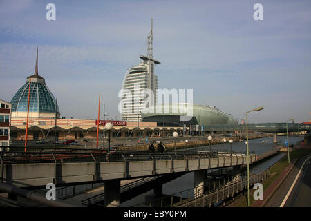 The old harbor in the foreground and in the background on the Weser dyke the 'Harbor Worlds Bremerhaven'. These include the German Emigration Center Bremerhaven, the Sea Zoo, the German Maritime Museum and more. Photo: Klaus Nowottnick Date: March 7, 2014 Stock Photo