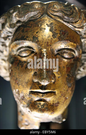 The ancient gilt-bronze head from the statue of Sulis Minerva the goddess of the Roman baths, Bath Stock Photo