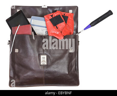 open leather briefcase with business and sport items isolated on white background Stock Photo