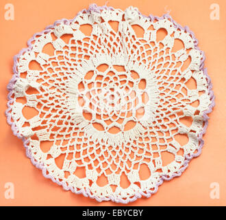 vintage knitting craftsmanship - placemat with embroidered crochet lace Stock Photo