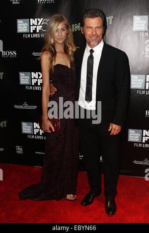 Josh Brolin (R) and Kathryn Boyd attend the 'Inherent Vice' world premiere during the 52nd New York Film Festival. Stock Photo