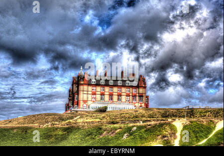 The Headland hotel Fistral beach Newquay coast Cornwall England UK like painting in HDR cloudscape Stock Photo