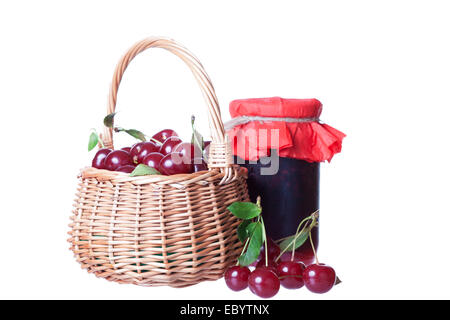 Cherry jam glass jar reflected on white background Stock Photo