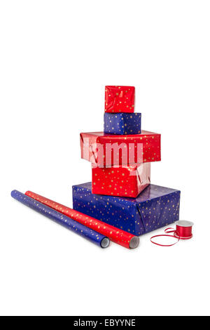 Stack of five presents in different sizes with blue and red wrapping paper and ribbon isolated on white background Stock Photo
