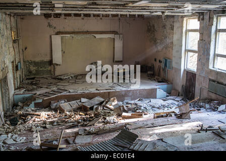 Main Auditorium of music school in Pripyat abandoned city, Chernobyl Exclusion Zone, Ukraine Stock Photo