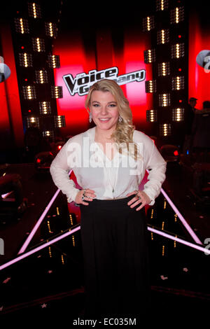 Berlin, Germany. 5th Dec, 2014. Candidate Charley Ann Schmutzler on stage during the live show of 'The Voice of Germany' in Berlin, Germany, 5 December 2014. The show will be aired on braodcaster Sat.1. Photo: Joerg Carstensen/dpa/Alamy Live News Stock Photo