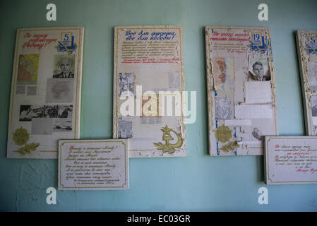 boards with Soviet notables in Middle School Number 3 in Pripyat abandoned city, Chernobyl Exclusion Zone, Ukraine Stock Photo