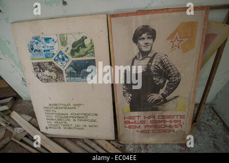 propaganda poster in Middle School Number 3 in Pripyat abandoned city, Chernobyl Exclusion Zone, Ukraine Stock Photo